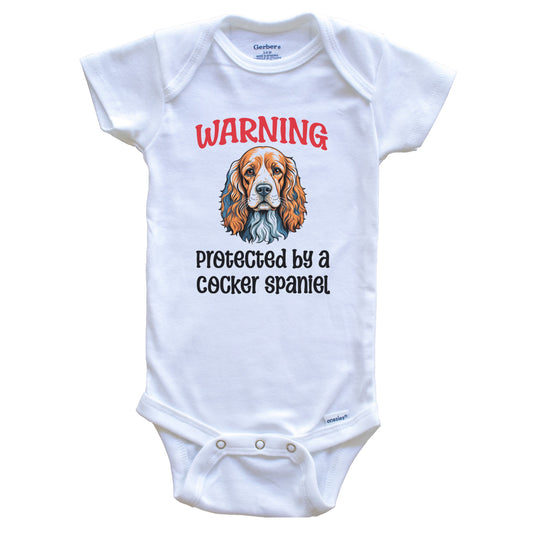 Warning Protected By A Cocker Spaniel Funny Dog Breed Baby Bodysuit