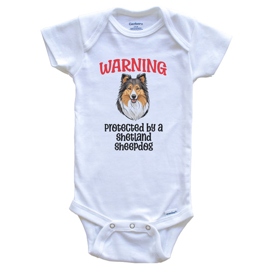Warning Protected By A Shetland Sheepdog Funny Dog Breed Baby Bodysuit