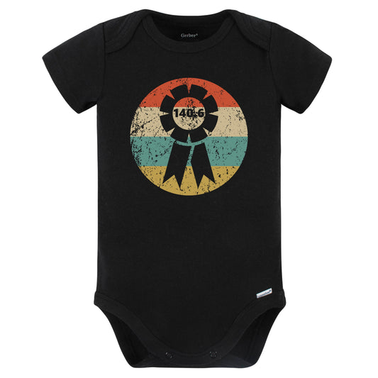 140.6 Triathlon Finisher Ribbon Icon Retro Triathlete Baby Bodysuit (Black)