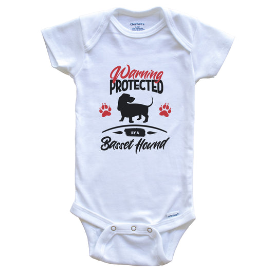 Warning Protected By A Basset Hound Funny Dog Owner Baby Bodysuit