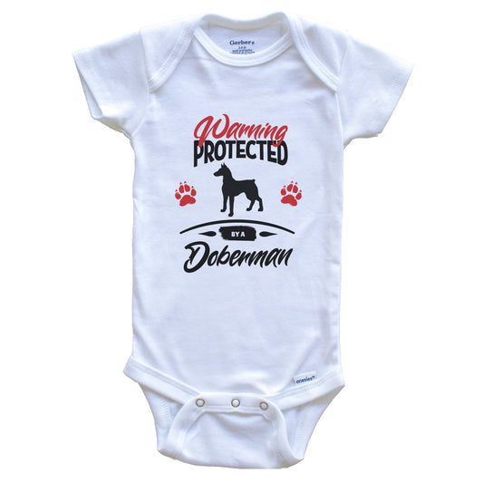 Warning Protected By A Doberman Funny Dog Owner Baby Bodysuit