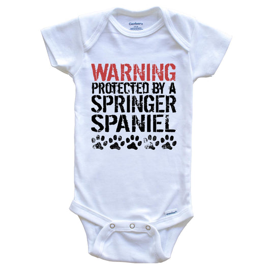Warning Protected By A Springer Spaniel Baby Onesie