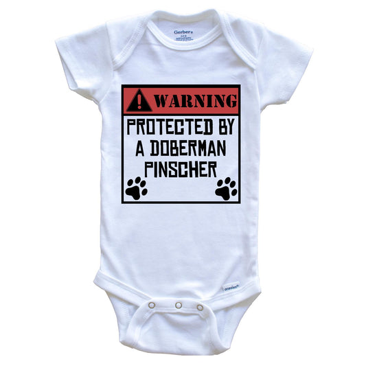 Warning Protected By A Doberman Pinscher Funny Baby Onesie