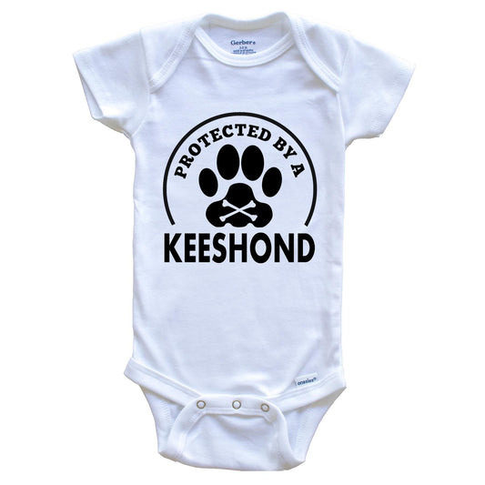 Protected By A Keeshond Funny Baby Onesie
