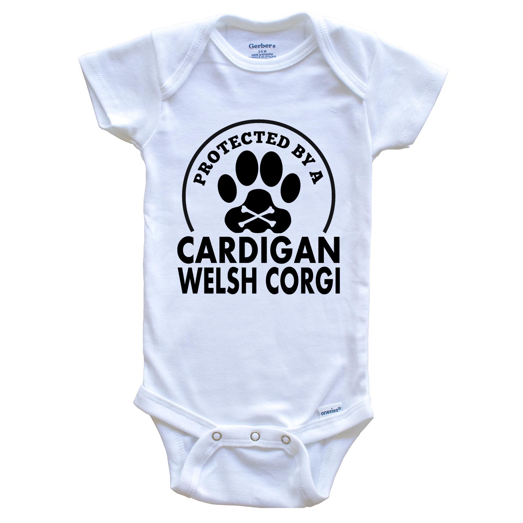 Protected By A Cardigan Welsh Corgi Funny Baby Onesie